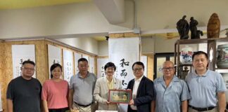澳门高明联合商会一行到访中华时报铜锣湾艺术馆 叙乡情话宗亲 翰墨传情谊